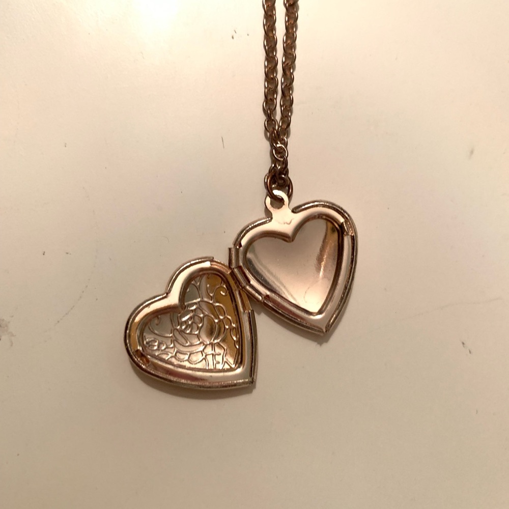 long gold necklace with rose heart locket charm